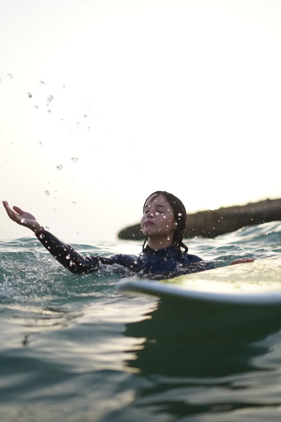 Surfer inside dynamic ocean whitewater during an in-water photography session in Morocco