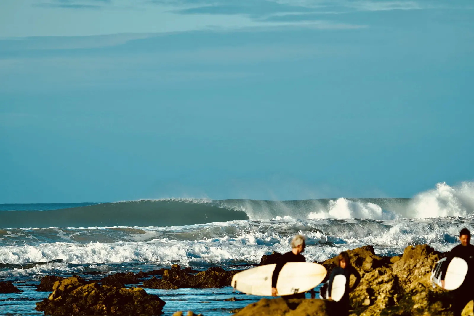 Surfers enjoying a session together along the Moroccan coast